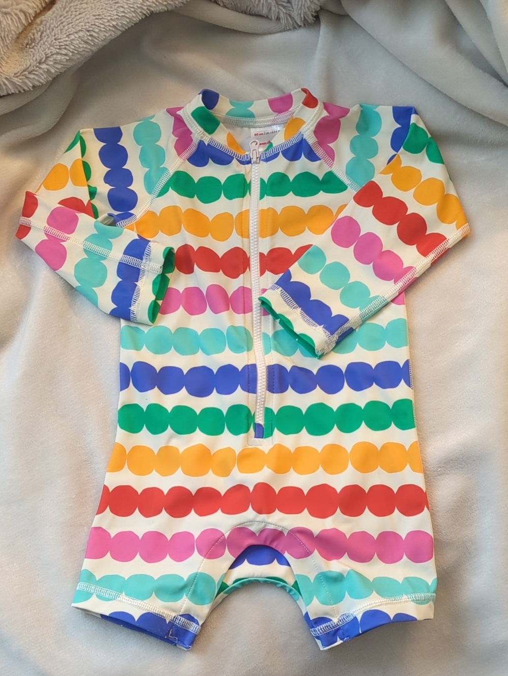 Hanna Andersson White One-Piece with Bright Polka Dots and Front Zip